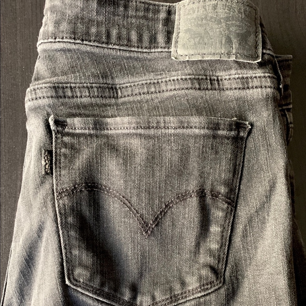 Levi’s -Distressed Black 711s
